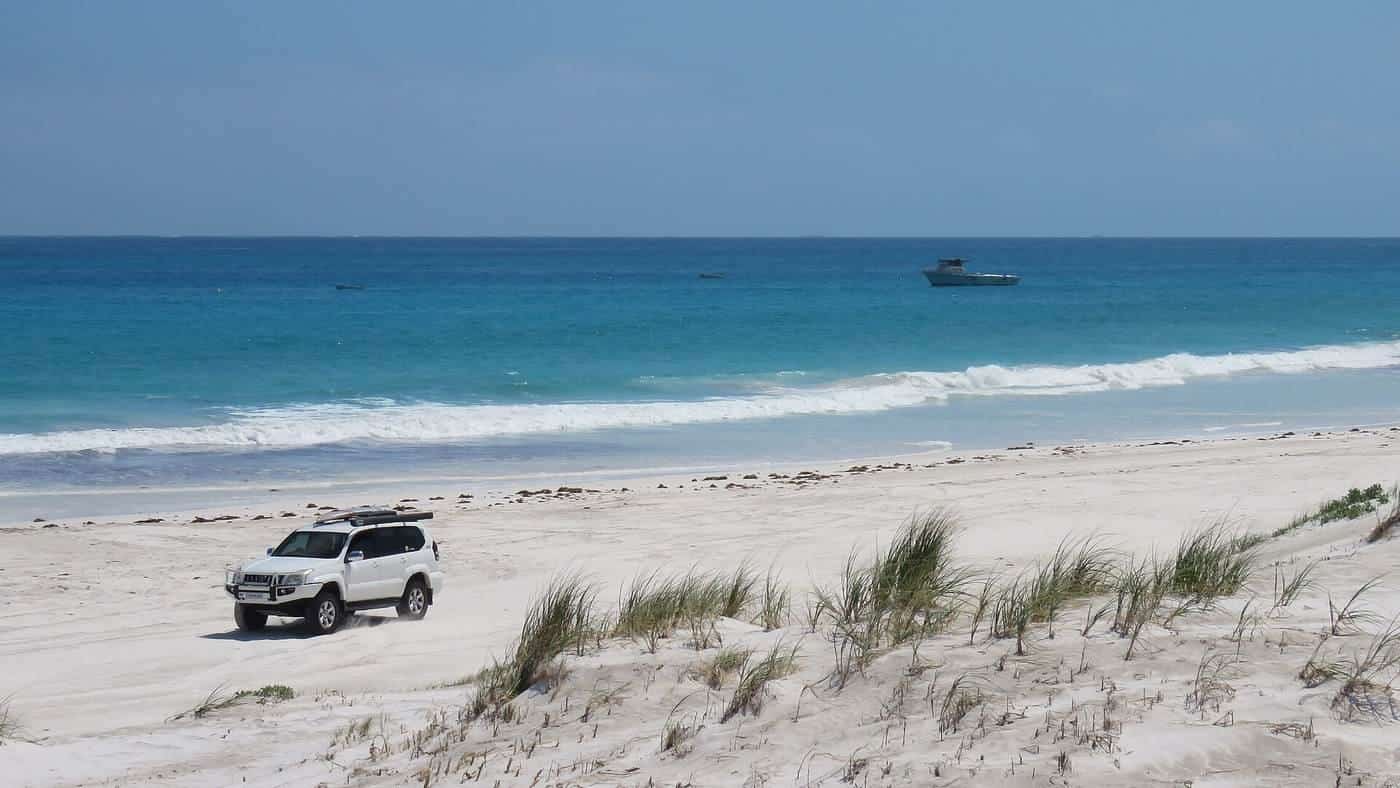 A four-wheel drive on the beach at Wedge Island, Western Australia