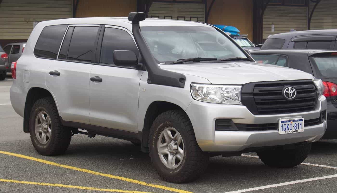 A Toyota LandCruiser 200 Series wagon parked on a street