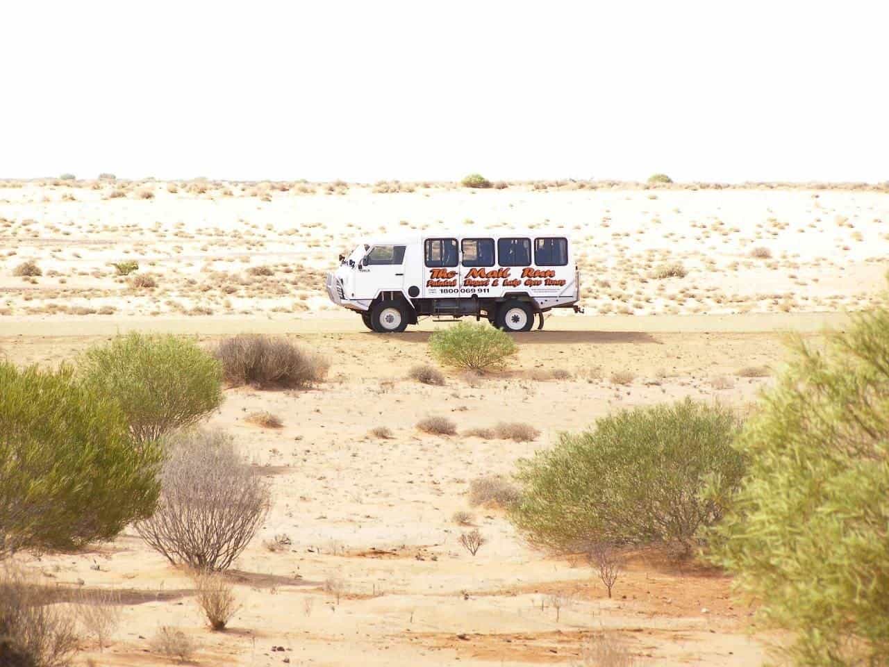 A four-wheel-drive mail truck on an outback track near Coober Pedy